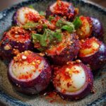 Mangosteen mit Chili-Pulver