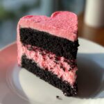 black and pink heart shaped cake